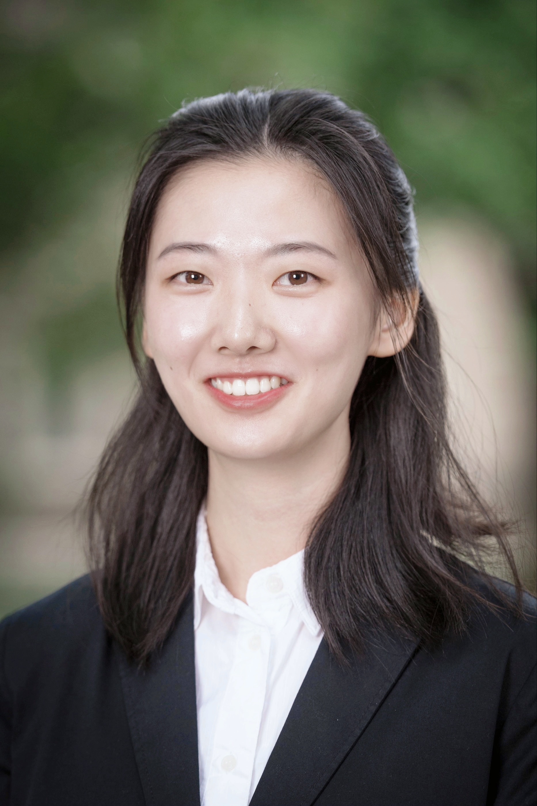 Headshot of Wenji Cao.