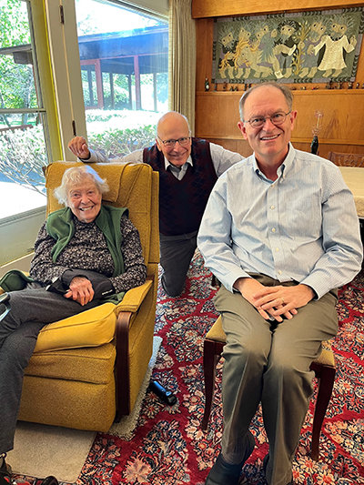 Dr. Wooldridge sits with Pauline and Jim Adams.